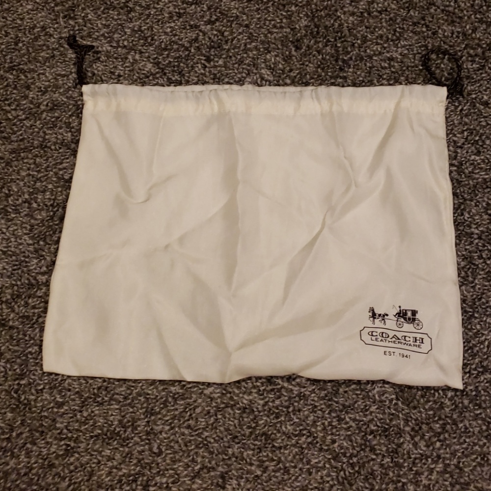 Coach wristlet satin dust cover